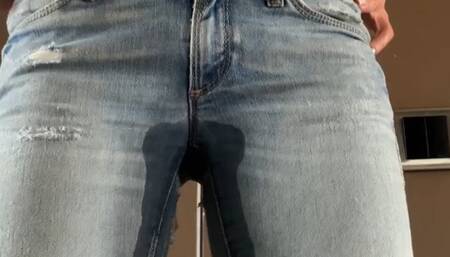I peed my jeans in front of the closed toilet door