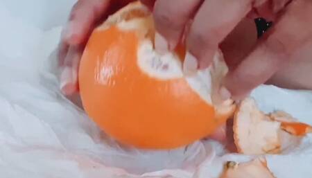 Peeling an Orange with long fingernails