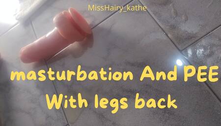 Pee with masturbation and legs back