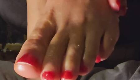 Grey socks and oiled toes