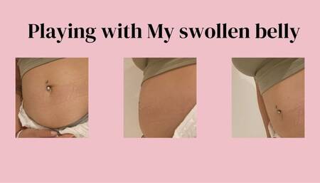 playing with my swollen belly