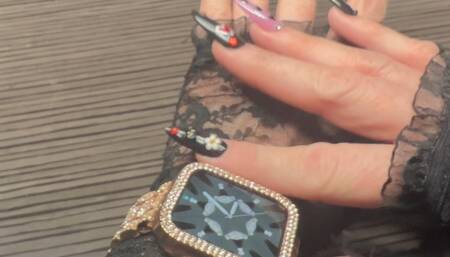 Harmony Shows Off Her Blingy Wrist Watch and Nails