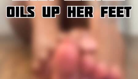 Ebony Giantess Oils up her feet