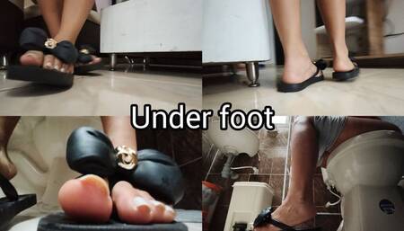 under giant foot