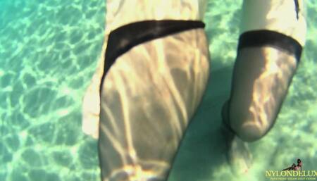 Seductive Stocking Teasing in the Sea: a Must-watch