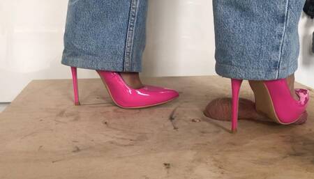 Pink stiletto pumps shoejob on cocktable