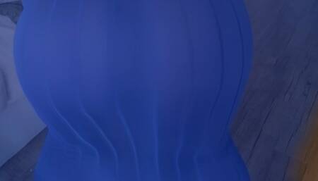 Ebony giantess twerking in a tight blue dress