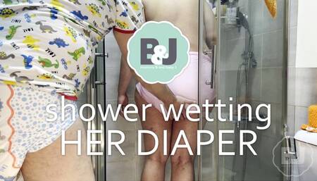 Shower wetting her diaper