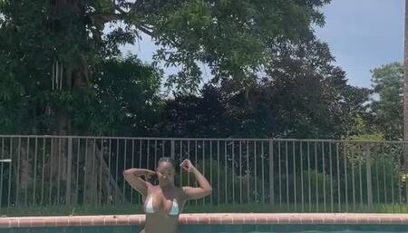 Ebony giantess takes a day at the pool