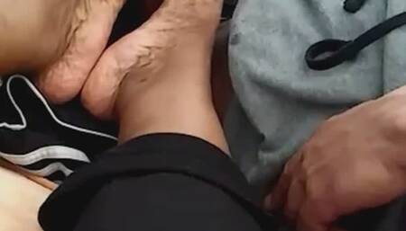 Footjob on his girlfriend couch