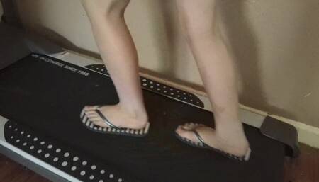 Hannah Runs On The Treadmill In Flip Flops