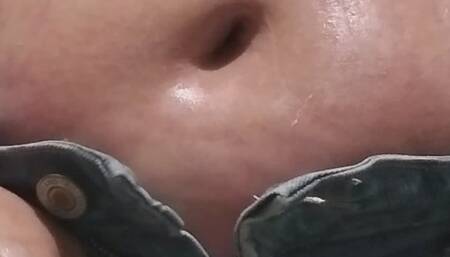 Rubbing my belly and bellybutton with a deodorant