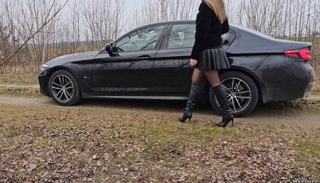 Driving BMW 5 series in Guess Leather Boots