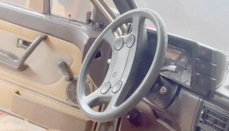 Secretary Chay crank & drive to work in gold pumps