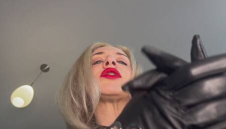 Hot goddess in leather teases and punishes you