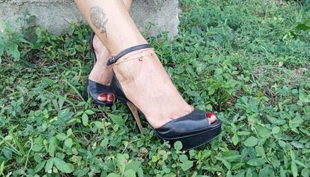 High heels dangling from the arched feet of a goddess like Roxan (3)