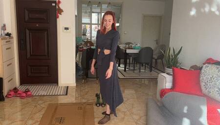 A girl in high-heeled shoes crushes fruits and vegetables