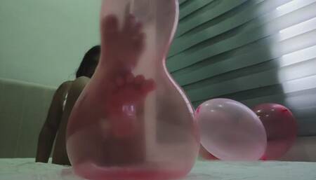 Foot pop red balloon