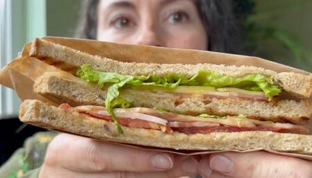 delicious sandwich and a glass of red m012