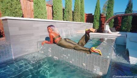 Naomi Swims in a Shiny Lucky Green Outfit