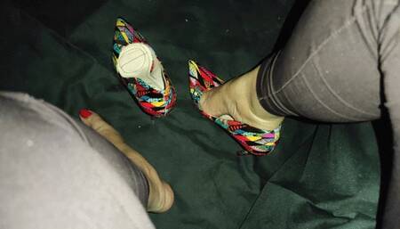 Alicia crosses her legs to let her stiletto heels dangle from her feet (2)