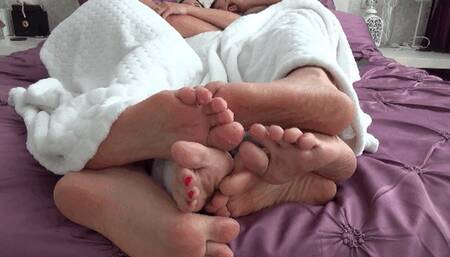 FOOT PLAY UNDER THE BLANKET (sp)