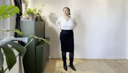 office girl standing in front of you in shiny pointed leather boots toe and heel tapping mg