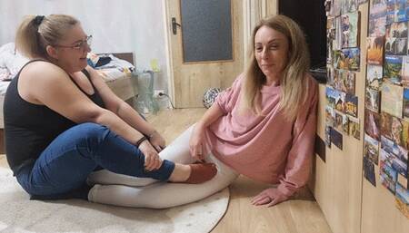 kendra sits full weight on my feet