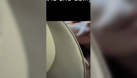 What Is She Doing in the Car?
