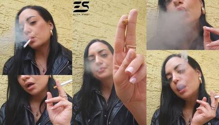 Outdoor smoke in a leather jacket