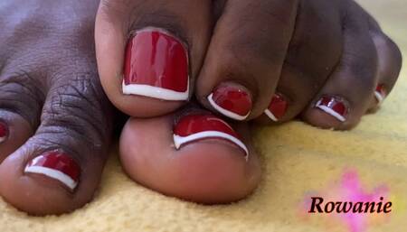 Rowanie spreading her fat polished toes, wiggling and jumping