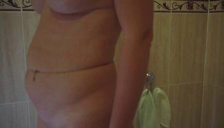 Drinking as much liquid as I can after dinner in a bath naked