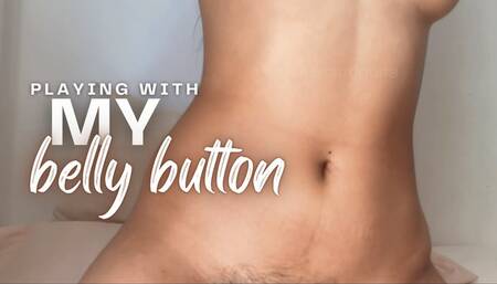 Playing with my belly button