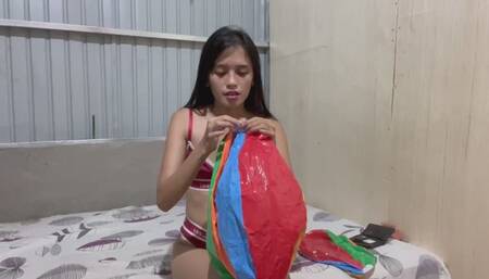 Blowing beach ball with Savannah part 1