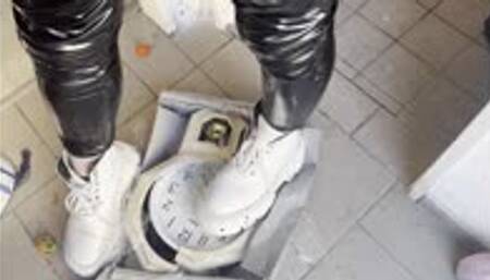 Shredding cheap clock and toy telephone