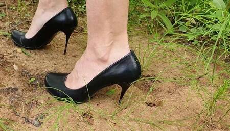 high heels stuck in a ground, high heels sinking, high heels wrecked, shoes stuck