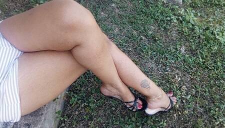 Beautiful lady with her rich cross legs and on her feet high heels (3)