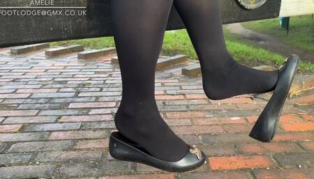 Sunny afternoon walk in ballet flats black tights
