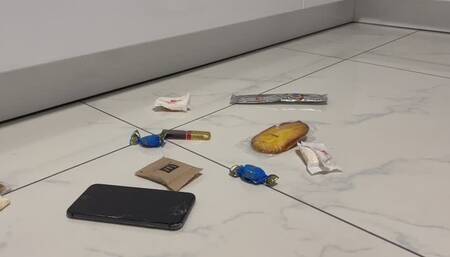 Marina crushes candy and a phone with her ballet shoes