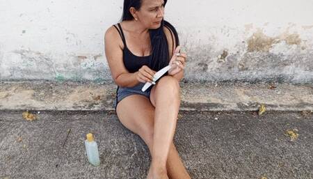 Roxan scratching her feet when she was in the middle of a park (3)