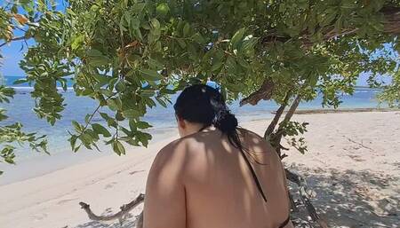 Naomi pops her balloon with a wand