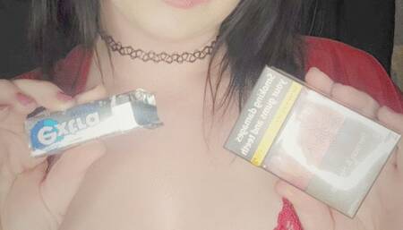Chewing gum whilst smoking wearing my tight little red dress