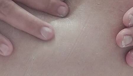 Cleaning my belly n belly button close up view