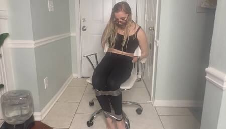 Agent Phoenix Sinz is bound and gagged