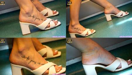 Foot and shoe fetish admiration, beauty feet with sandal mules heels