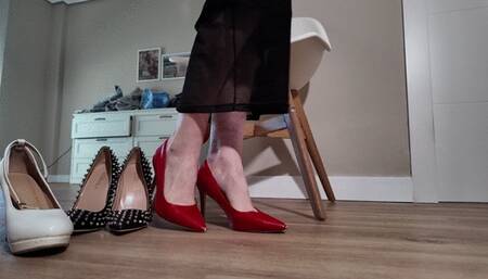 Trying on different high heels and putting on stockings, close up high quality