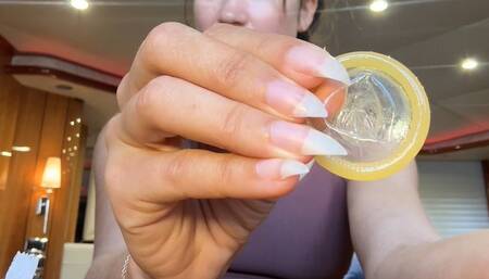 Nail Goddess destroying and teasing condom with natural nails