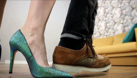 Agent John steps on left foot of super model