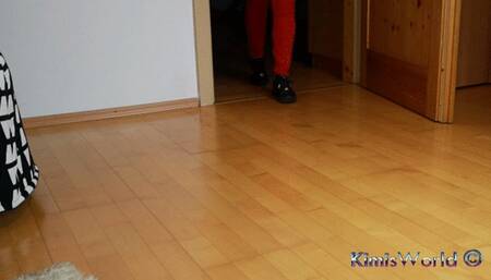 Red jeans and black sneakers