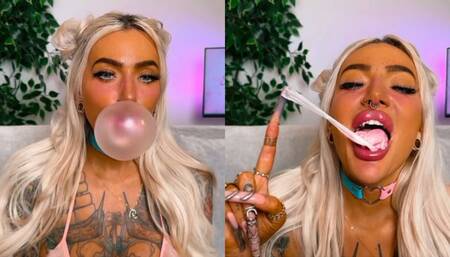 Big lips blowing popping bubblegum bubbles long nails